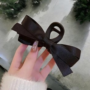 H�rklemme med sort sl�jfe p� begge sider