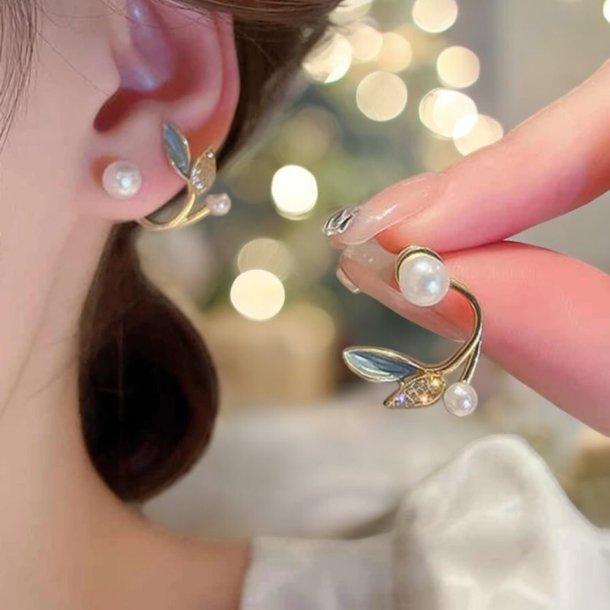 Blad formet reringe med bl blade og perler