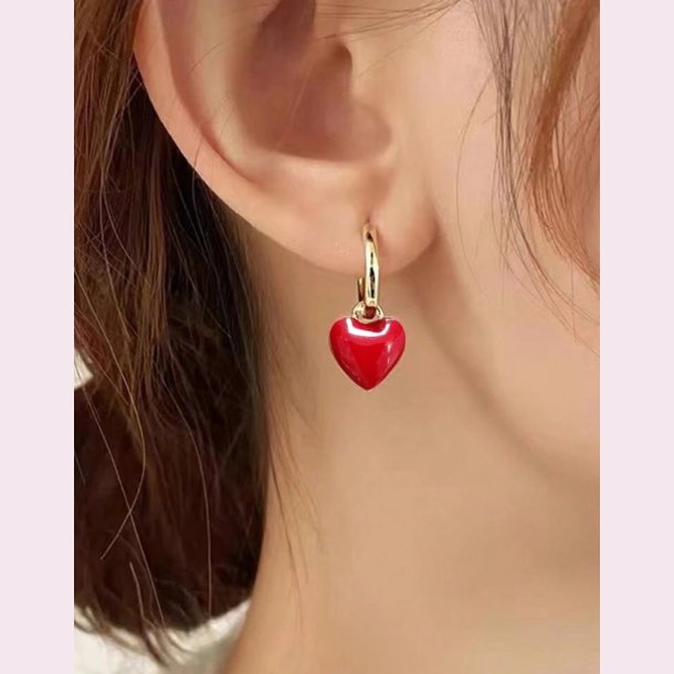 reringe med rde hjerter