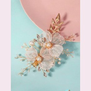 Guldfarvet hrclips med de smukkeste blomster og rhinesten