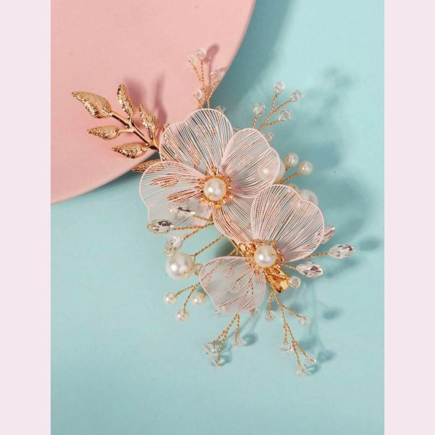 Guldfarvet hrclips med de smukkeste blomster og rhinesten