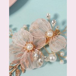 Guldfarvet hrclips med de smukkeste blomster og rhinesten