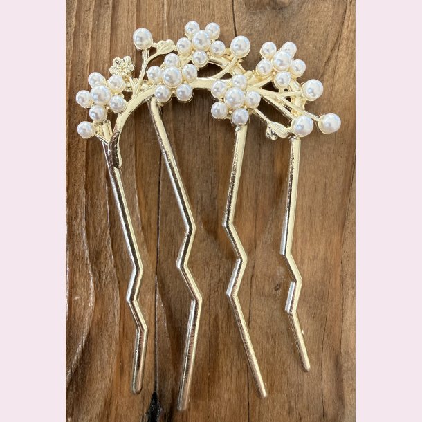 Elegant h�rsmykke med hvide perler