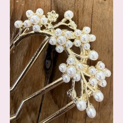 Elegant h�rsmykke med hvide perler
