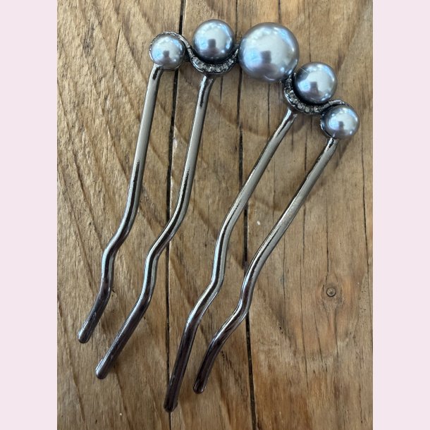 Elegant h�rkam med gr�lige perler