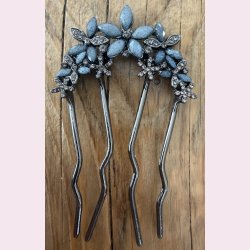 Eksklusive h�rn�le med bl�lige blomster