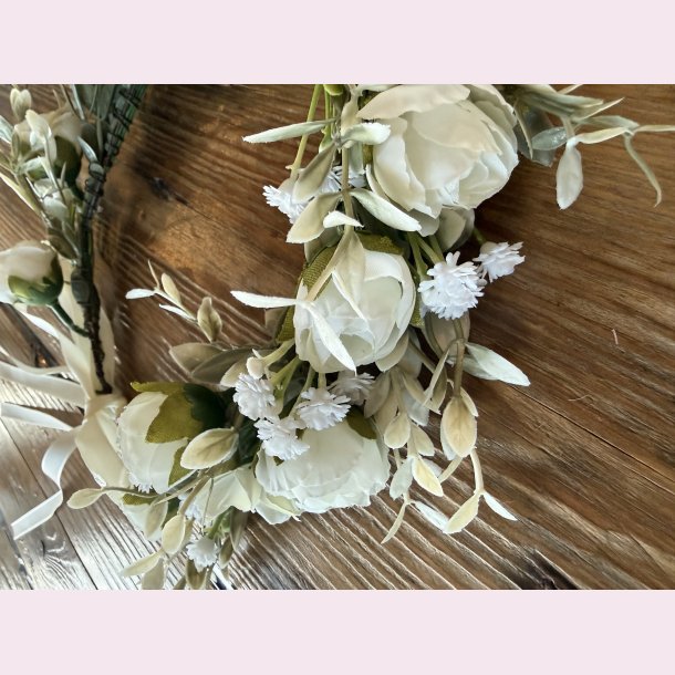 Blomsterkrans med satinb�nd