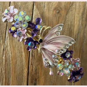 H�rsp�nde med sommerfugl og blomster