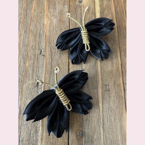 H�rsp�nder med de s�deste sommerfugle - Sort