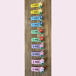 Sm hrspnder med fine blomster i flere farver