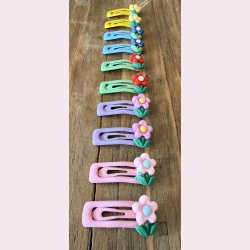 Sm hrspnder med fine blomster i flere farver