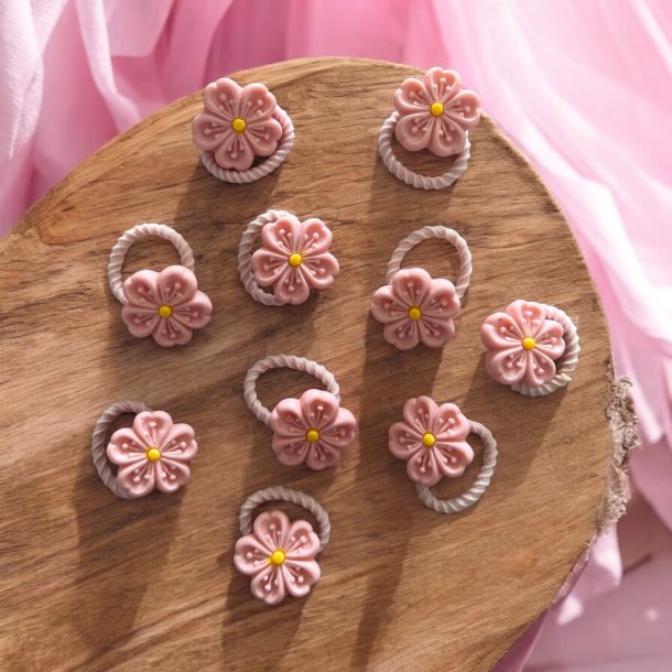 Sde sm lyserde blomster elastikker