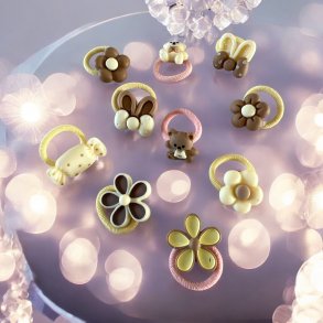 Sde elastikker med forskellige figur i - Lyserde, cremede, brune farver