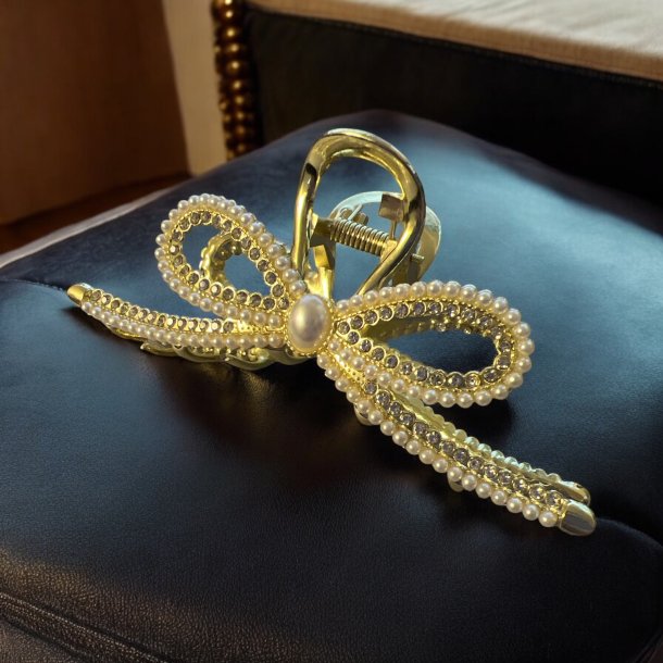 Elegant guld hrspnde med hvide perler og krystaller