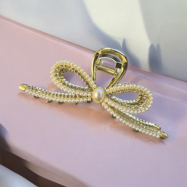 Elegant guld hrspnde med hvide perler og krystaller