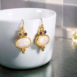 reringe med smukke lilla zirkonia sten