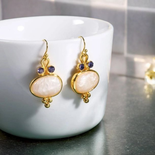 reringe med smukke lilla zirkonia sten