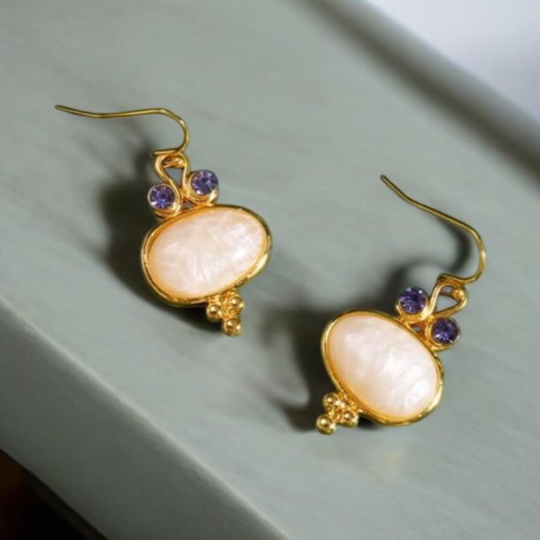 reringe med smukke lilla zirkonia sten