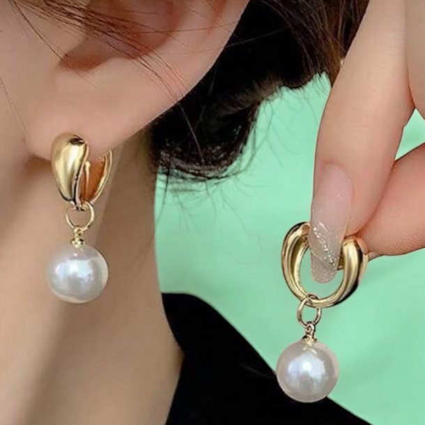 Elegante reringe med fine hvide perler - Forgyldt