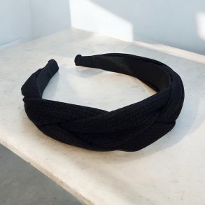 Hrbjle i lkkert bldt stof med snoede detaljer - Sort