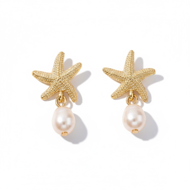 reringe med sstjerne og smuk hvid perle