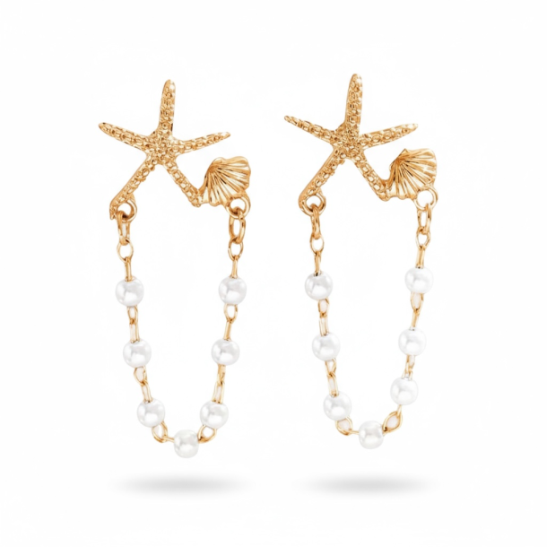 reringe med sstjerne og smukke hvide perler - Forgyldt