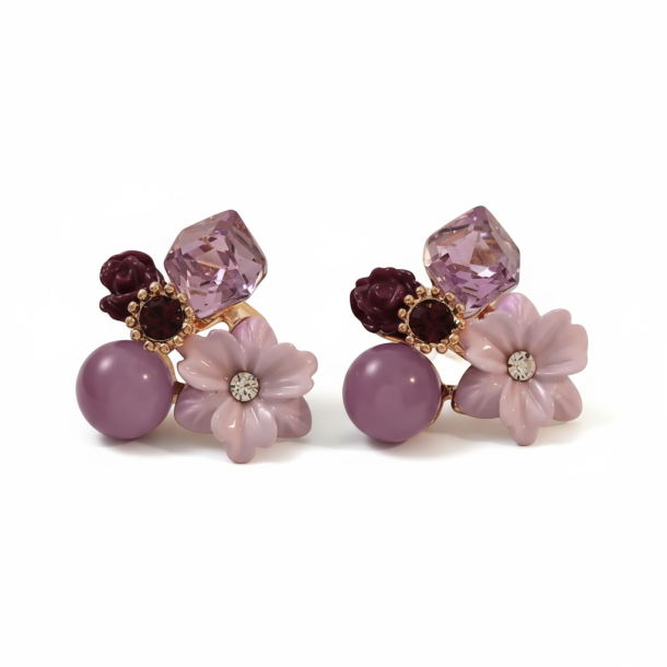 Sde lilla reringe med blomster og krystaller