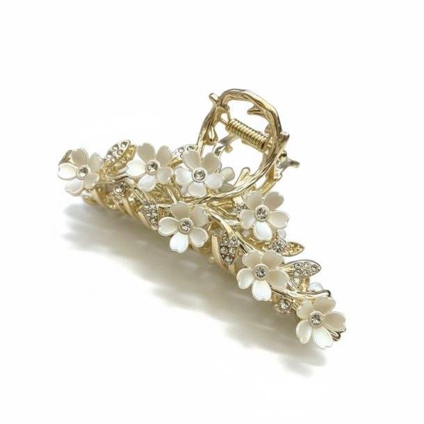 Elegant h�rklemme med blomster og sten