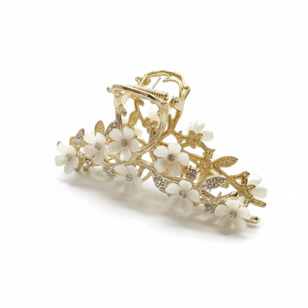 Elegant h�rklemme med blomster og sten