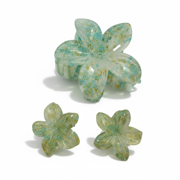 H�rklemmer med blomster � elegant og feminin