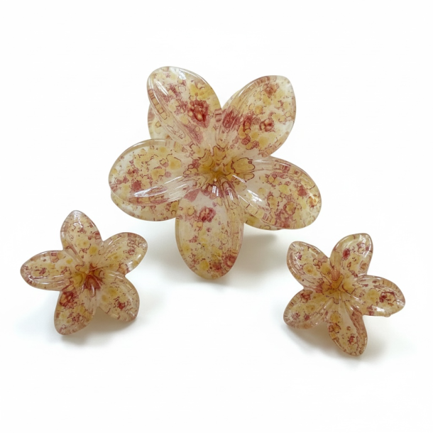 H�rklemmer med blomster � elegant og feminin