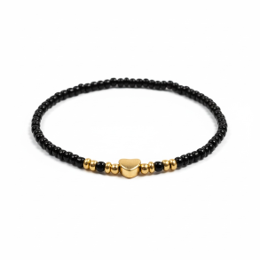 Sort elastikarmb�nd med guldfarvet hjerte