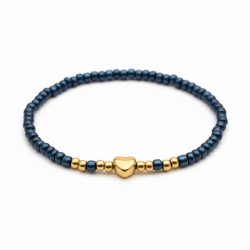 Bl�t elastikarmb�nd med guldfarvet hjerte