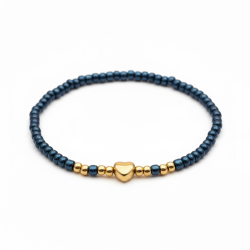 Bl�t elastikarmb�nd med guldfarvet hjerte