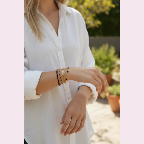 Justerbare armb�nd i guld og sort - 4 stk