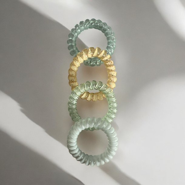 Spiral elastikker  grnne nuancer  og mnster