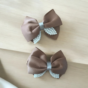 2 stk. smukke brune sljfe hrclips 