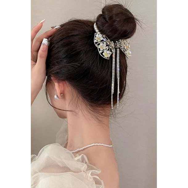 Smykke til at stte omkring en knold