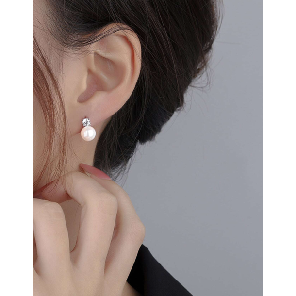 Smukke fine reringe med zirkonia sten og perle