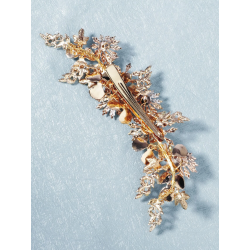 Stor hrnl med blomster og perler i gylden nuancer 