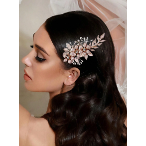 Hrklemme med blomster og perler i gylden nuancer 