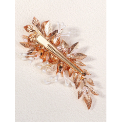 Hrklemme med blomster og perler i gylden nuancer 