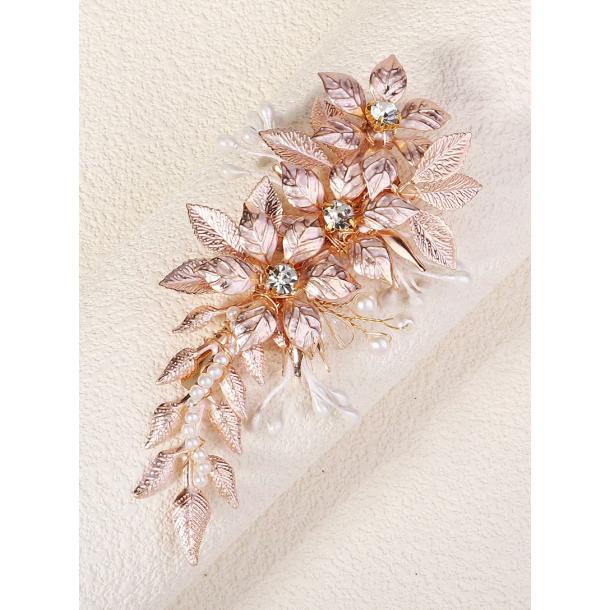 Hrklemme med blomster og perler i gylden nuancer 