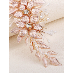 Hrklemme med blomster og perler i gylden nuancer 