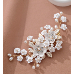 Guldfarvet hrclips med smukke blomster og sm sde perler 