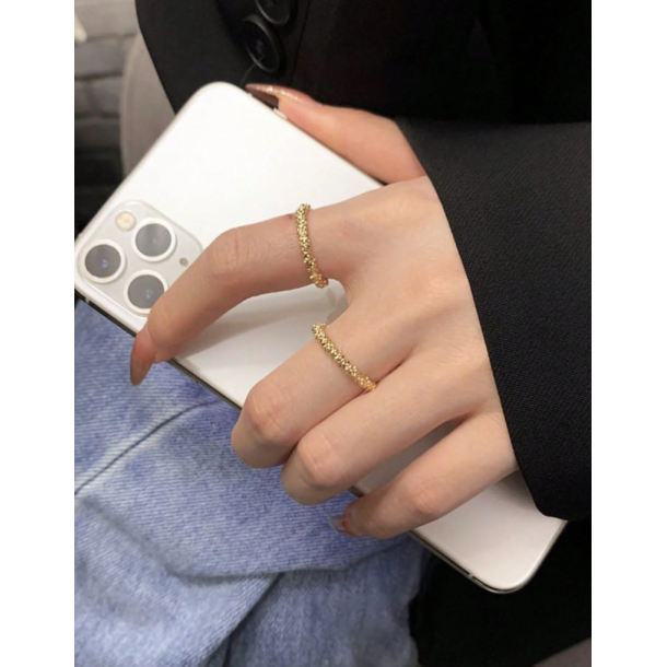 Justerbar ring i hamret mnster - Guld farvet