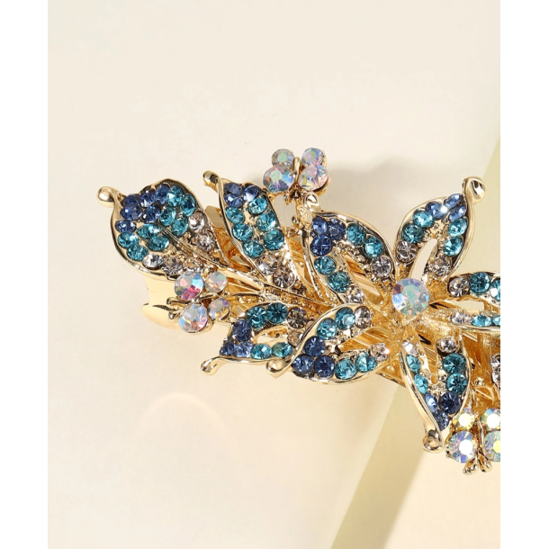 Patentspnde med smukke farvede rhinesten.