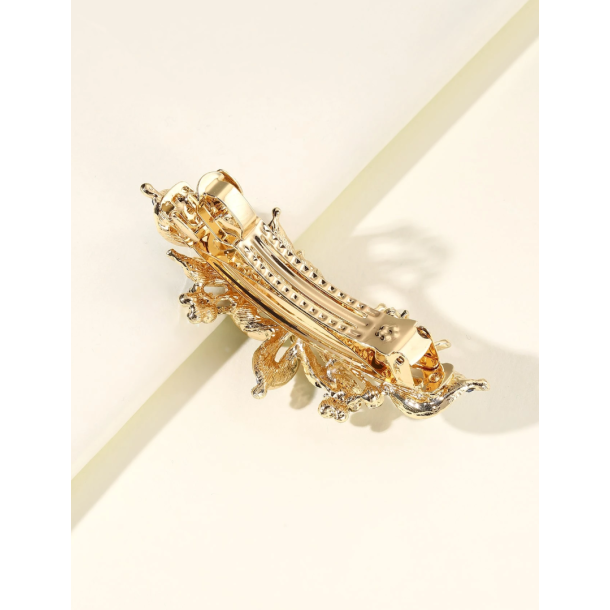 Patentspnde med smukke farvede rhinesten.