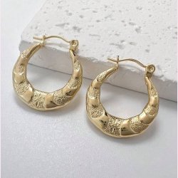 Forgyldt reringe med mnster