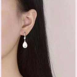 Smukke fine reringe med zirkonia sten og perle - Slv